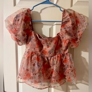 NWT Evolutionary Peplum Floral Top